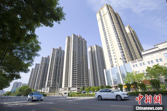 資料圖：車輛從一樓盤前經(jīng)過(guò)。 <a target='_blank' href='/'><p  align=