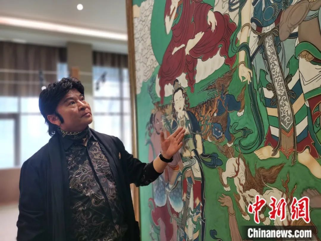 國家一級(jí)美術(shù)師劉觖。張?zhí)砀?攝